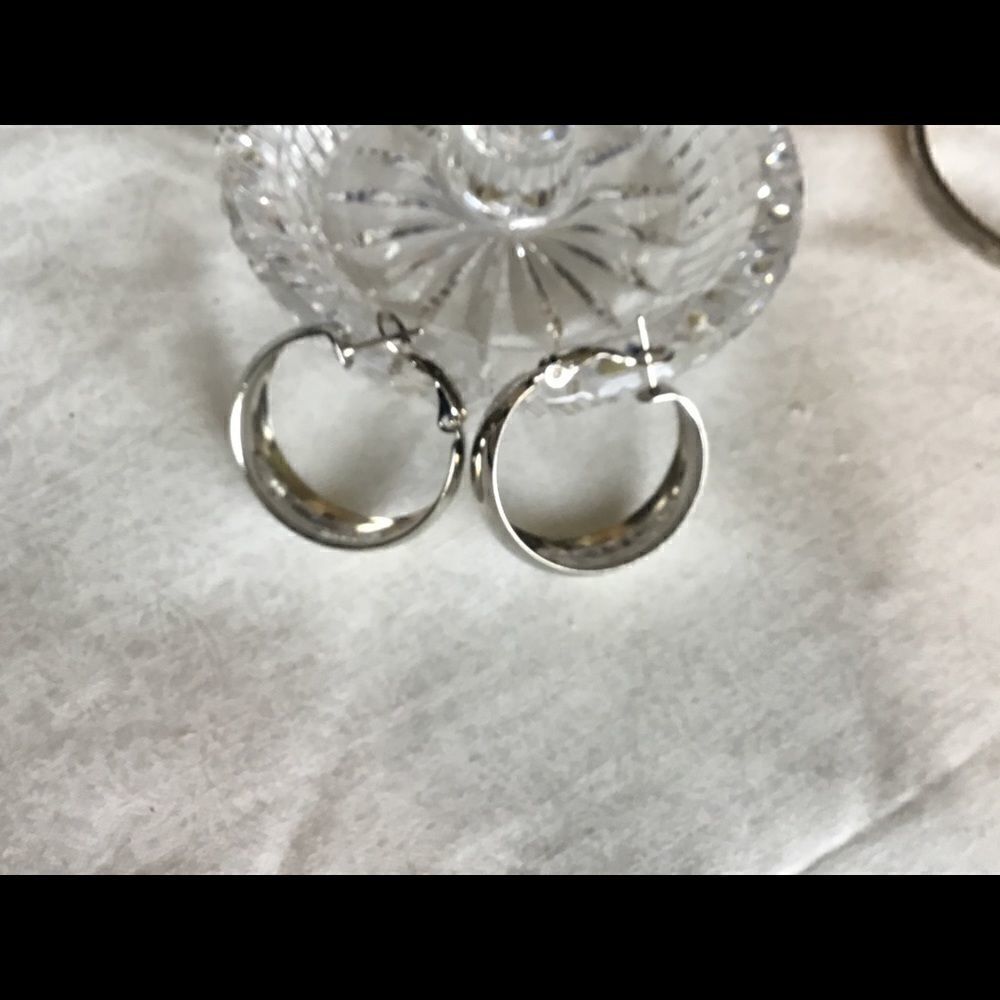 $8 ea or 3/$15. Silvertone Shiny Hoop Earrings.